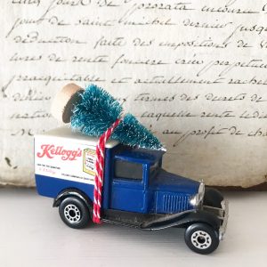Lovely little Kelloggs van with bottle brush tree